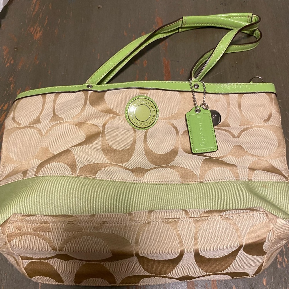 Tan and Lime signature coach bag. (Authentic)